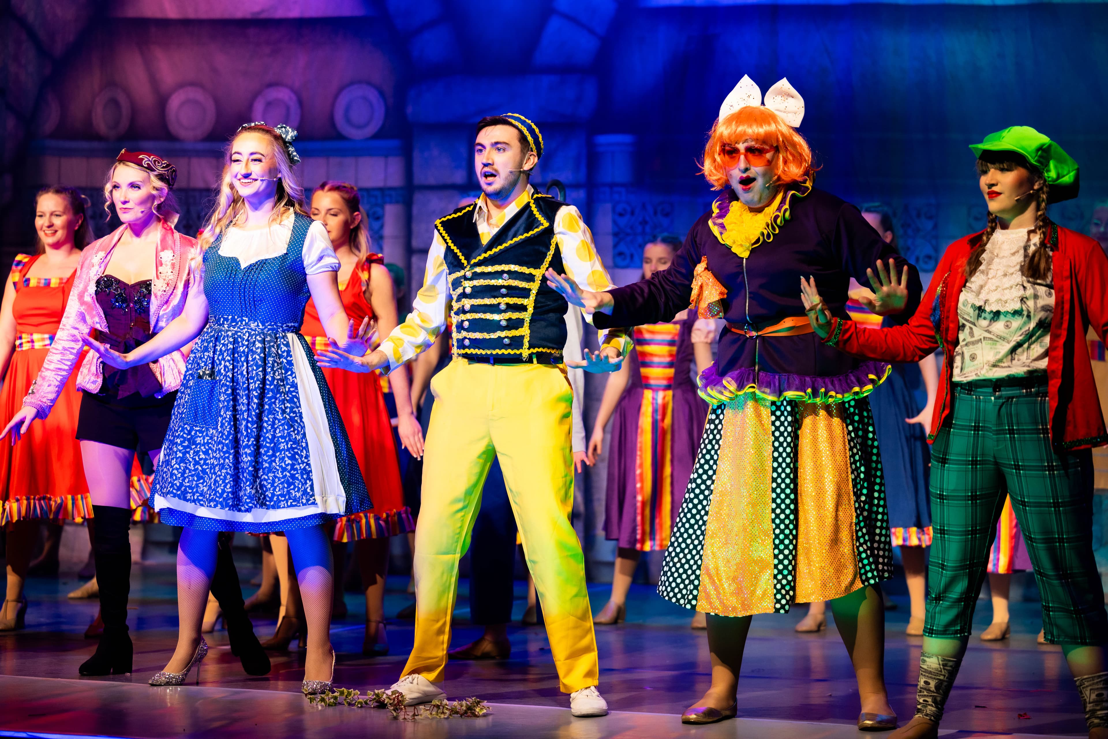 The cast of Cinderella pose during the final song of the show. They are led by Cinderella, Buttons, and Lenore.